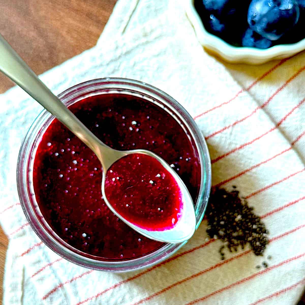 No sugar blueberry chia seed jam in a glass jar