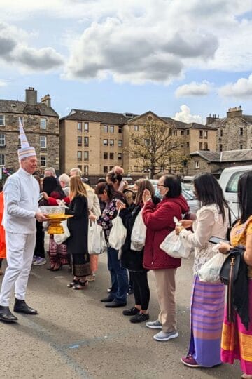 Group of Thai people celebrating SongKran in Edinburgh