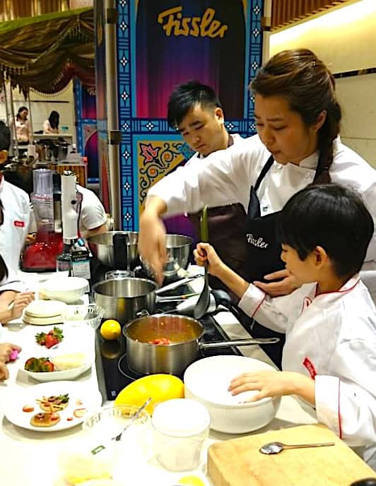 Bonnie Yves is cooking jam with kids at Fissler event at Sogo Hong Kong