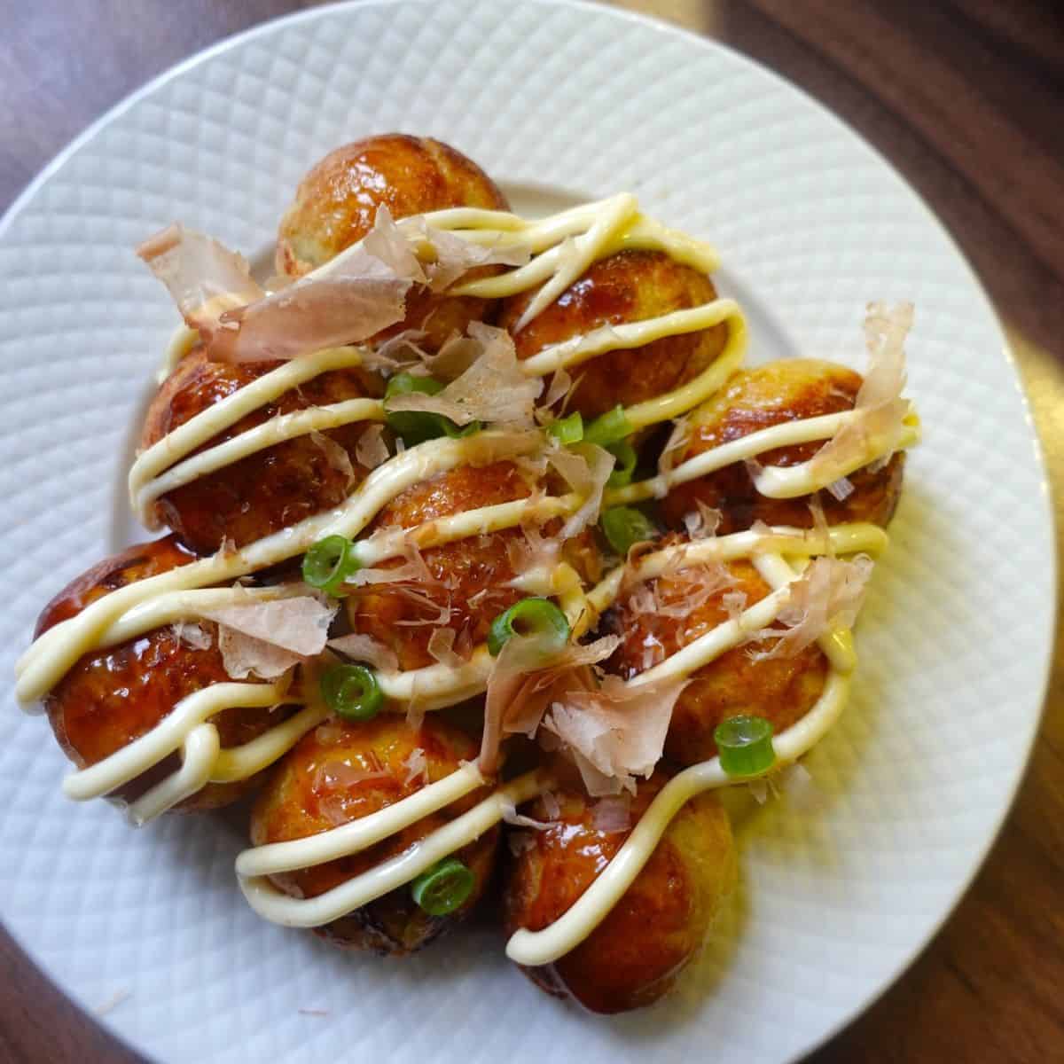 Takoyaki on a white plate